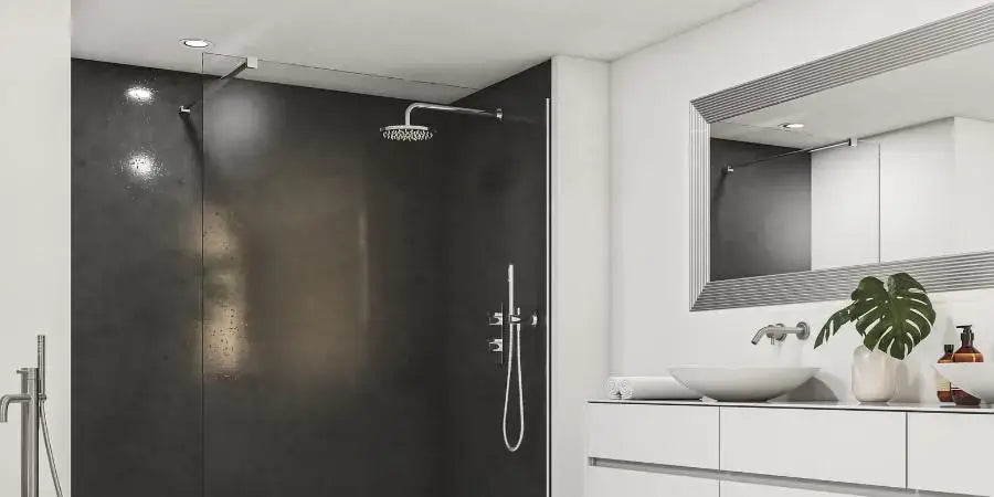 Baño moderno con ducha de obra, rociador y grifería empotrada frente al mueble de lavabo